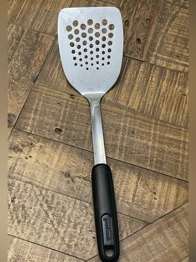 GoodCook stainless steel slotted turner features a 13-inch length